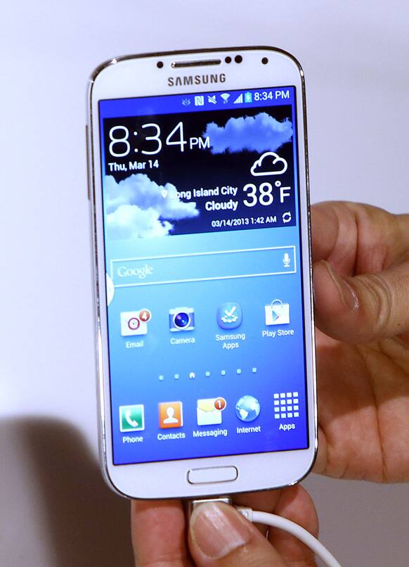 The new Samsung Galaxy S 4 is presented during the Samsung Unpacked event at Radio City Music Hall, New York.