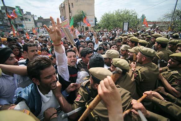 India’s opposition Bharatiya Janata Party (BJP) activists protesting against Wednesday’s militant attack in Srinagar scuffle with police in Jammu.