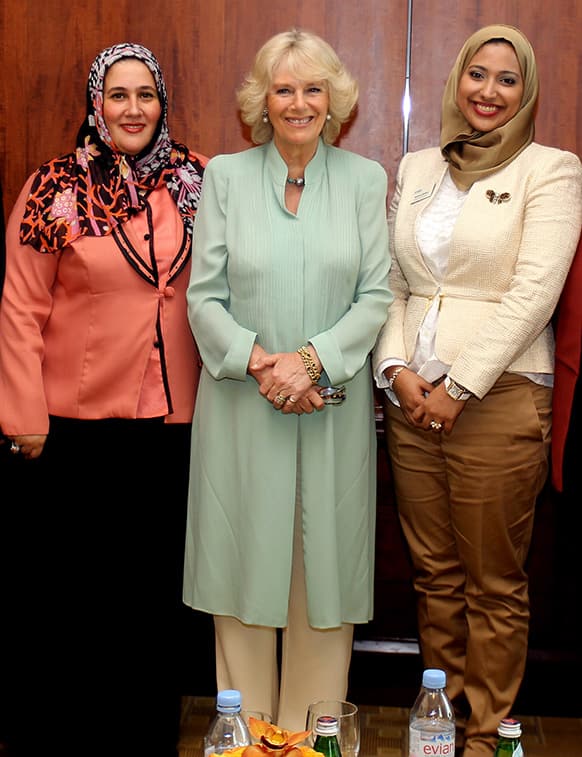 Camilla, Duchess of Cornwall, center, poses for a photograph with participants and organizers of the British Council Springboard Program for women`s development in Doha, Qatar.