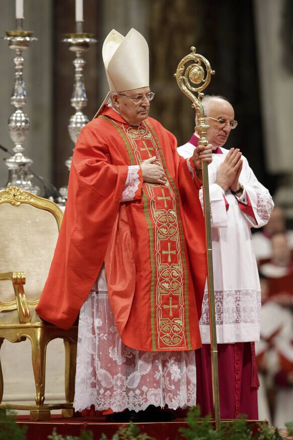 Cardinal Angelo Sodano celebrates a Mass for the election of a new pope inside St. Peter`s Basilica, at the Vatican.