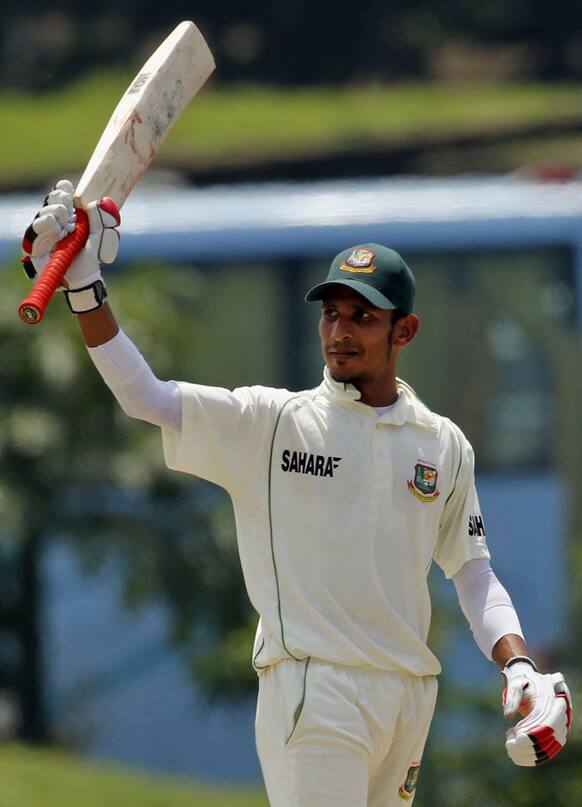 Bangladesh`s Nasir Hossain celebrates scoring a half century during the fourth day of the first cricket test match against Sri Lanka in Galle, Sri Lanka.