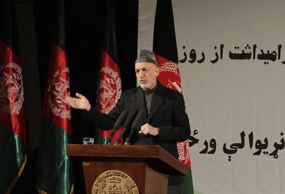 Afghan President Hamid Karzai speaks during a nationally televised speech about the state of Afghan women in Kabul, Afghanistan.