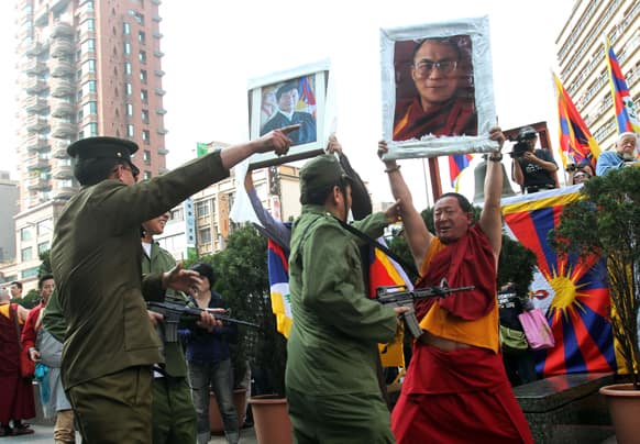 Tibetans perform a street drama depicting Tibet`s uprising in 1959 against Chinese rule in Taipei, Taiwan, marking the March 10 anniversary of the failed 1959 uprising.
