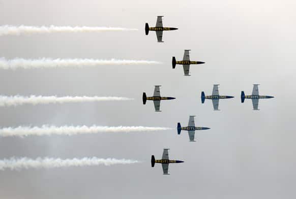 French Breitling Jet Team comprising of 7 Aero L-39 Albatross planes fly in formation during their Southeast Asian Tour aerobatics showcase, in Singapore.