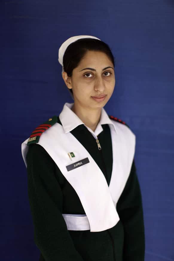 Pakistani army cadet Aamna, 25, who is deployed as a nurse at the Combined Military Hospital Rawalpindi, poses for a picture at the hospital, on International Women`s Day, in Rawalpindi, Pakistan.