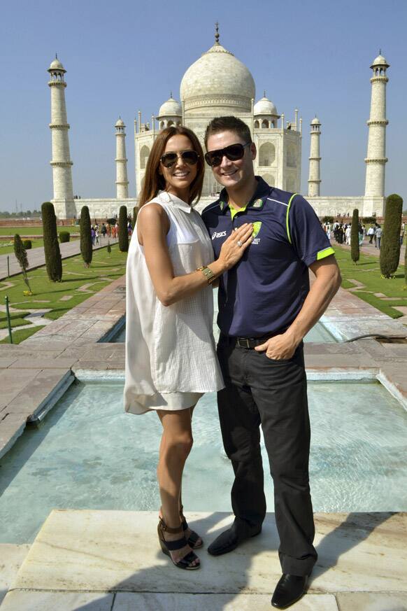 Australian cricket team captain Michael Clarke and his wife Kyly Clarke pose for a photograph in front of the Taj Mahal in Agra.