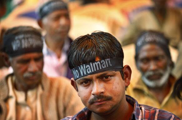 Traders and their dependents attend a rally to protest against foreign direct investment (FDI) in the retail sector in New Delhi.