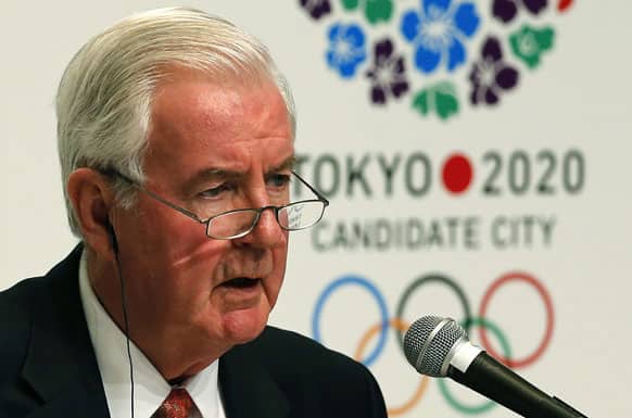 International Olympic Committee Vice President Craig Reedie, of Britain, speaks during a press conference in Tokyo.