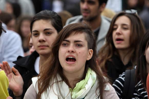 Students shout slogans during a rally against a planned shakeup of Greece`s university system in Athens.