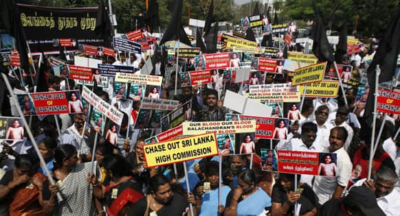 Indian Tamil activists and supporters of MDMK party hold placards during a protest against Sri Lanka`s alleged wartime abuses near the Sri Lankan Deputy High Commission (SLDHC) in Chennai.
