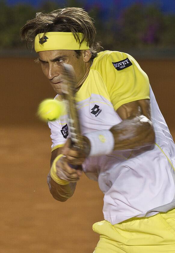 Spain´s David Ferrer returns the ball to Spain´s Rafael Nadal during the final round match at the Mexico Open tennis tournament in Acapulco, Mexico.