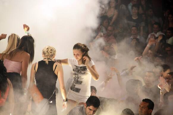 Spring Break revelers dance at a club during Spring Break in the resort city of Cancun, Mexico. Cancun is one of the No. 1 foreign destination for U.S. college students during Spring Break.