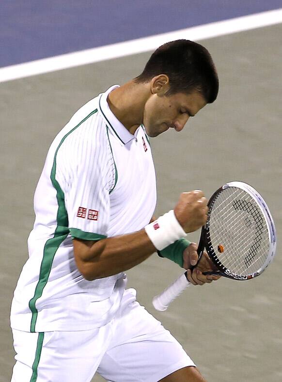 Novak Djokovic of Serbia celebrates a crucial point in the tie-break against Juan Martin Del Potro of Argentina during the semi-finals of the Dubai Duty Free Tennis Championships.