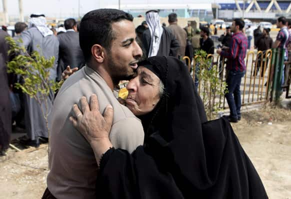 A former prisoner hugs his mother after being released from a prison in Baghdad, Iraq. Some 165 prisoners were released from the Iraqi Interior Ministry custody on Thursday.
