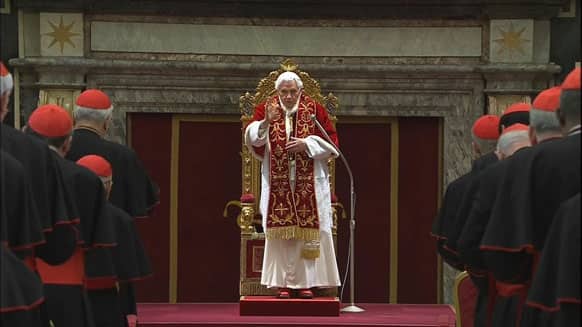Pope Benedict XVI deliveres his final greetings to the assembly of cardinals at the Vatican, before he retires in just a few hours..
