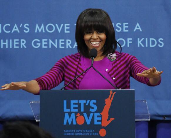 First lady Michelle Obama motions before speaking at a