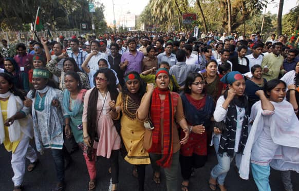 Bangladeshi protesters march to submit a memorandum demanding the immediate arrest of Mahmudur Rahman, acting Editor of a Bangla newspaper Amar Desh, accusing him of spreading communal hatred and instigating violence through the newspaper, in Dhaka.