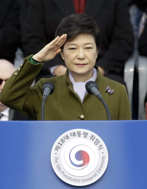 South Korea`s new President Park Geun-hye salutes during the 18th presidential inauguration ceremony at the National Assembly in Seoul, South Korea.