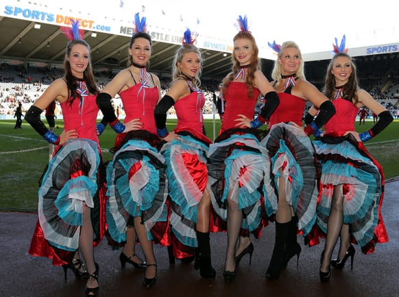 A group of french dancing ladies are seen ahead of the English Premier League soccer match between Newcastle United and Southampton at St James` Park, Newcastle, England.