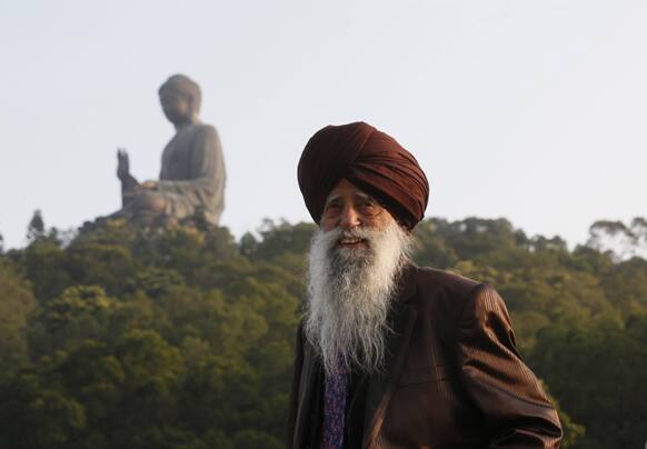 Centenarian marathon runner Fauja Singh, 101, originally from Beas Pind, India but now lives in London, visits the giant seated Buddha statue in Hong Kong`s outlying Lantau Island . Singh will participate in a 10-kilometer race at the Hong Kong Marathon on Sunday before retiring from public races.