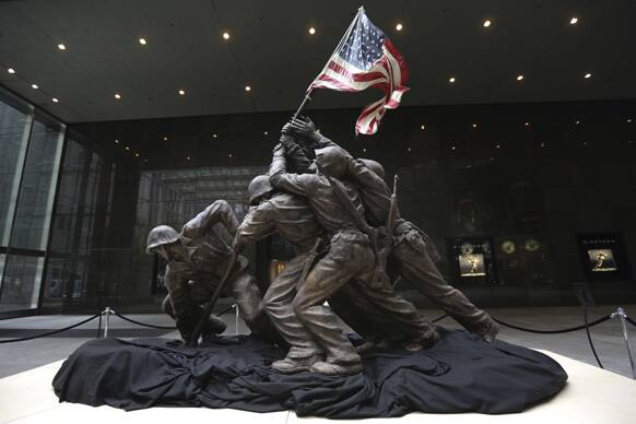 The original 12 1/2-foot (4 meter) cast stone version of Felix de Weldon`s iconic statue depicting soldiers raising the U.S. flag at Iwo Jima is on display.