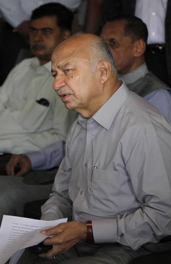 Union Home Minister Sushil kumar Shinde talks to the media after visiting the site of bomb blasts in Hyderabad.