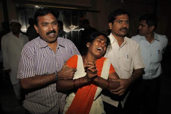 A woman Sujatha, wails after seeing her husband Venkateshwarulu`s body, killed in bomb blast, at a mortuary at Government hospital in Hyderabad.