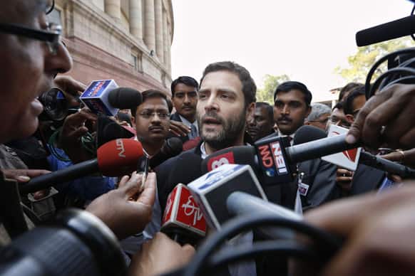 Congress party leader Rahul Gandhi talks to journalists after attending the first day of the budget session in New Delhi.