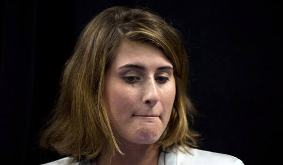 Canadian tennis player Rebecca Marino pauses as she addresses reporters during a news conference in Vancouver, British Columbia. A loss of passion for professional tennis and a battle with depression prompted Marino to apply the brakes to her career for the second time in less than a year.