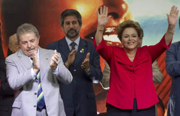 Brazil`s former President Luiz Inacio Lula da Silva, left, and Brazil`s President Dilma Rousseff attend a ceremony marking the 33rd anniversary of the foundation of the Ruling Workers Party and its 10 years in power in Sao Paulo, Brazil.