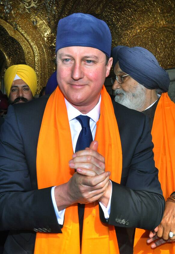 British Prime Minister David Cameron visits the Golden Temple, Sikh’s holiest shrine in Amritsar.