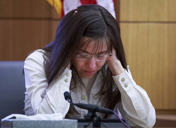 Defendant Jodi Arias talks about the text messages with Travis Alexander from March through May 2008, as she testifies in her murder trial st Judge Sherry Stephens` Superior Court.