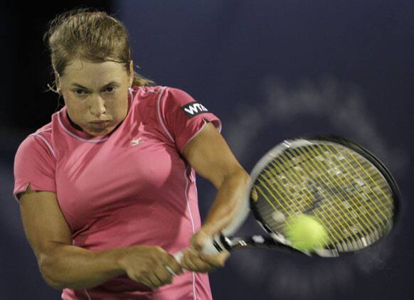 Yulia Putintseva from Kazakistan returns the ball to Laura Robson from Great Britain during the first day of Dubai Duty Free Tennis Championships in Dubai, United Arab Emirates.