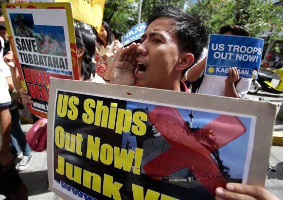 A Filipino protester shouts slogans during a rally near the US Embassy in Manila, Philippines.