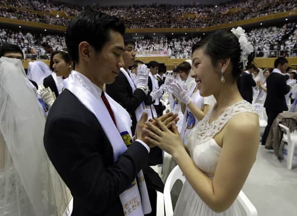 Couples from around the world participate in a mass wedding ceremony at the CheongShim Peace World Center in Gapyeong, South Korea.