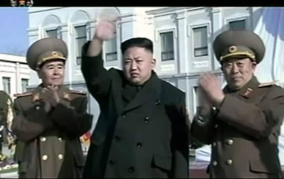 This image made from video, North Korean leader Kim Jong Un, center, waves as he attends a statue unveiling ceremony at Mangyongdae Revolutionary School in Pyongyang, North Korea on the anniversary of late North Korean leader Kim Jong Il`s birthday.