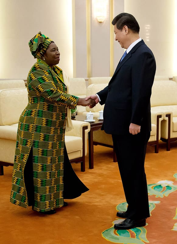 African Union chairperson Nkosazana Dlamini-Zuma, left, is greeted by Chinese Communist Party Secretary General and the country`s new leader Xi Jinping during a meeting at the Great Hall of the People in Beijing.