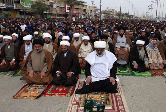 Followers of Shiite cleric Muqtada al-Sadr pray during Friday prayers in the Shiite stronghold of Sadr City in Baghdad, Iraq.