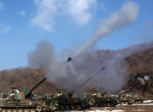 South Korean army K-9 self-propelled guns fire live rounds during an exercise at Fire Training Field in Cheorwon, South Korea.