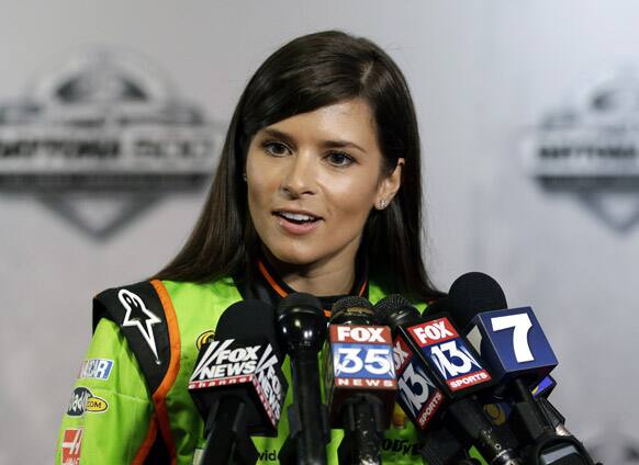 Danica Patrick speaks with reporters during NASCAR media day at Daytona International Speedway, in Daytona Beach, Fla.