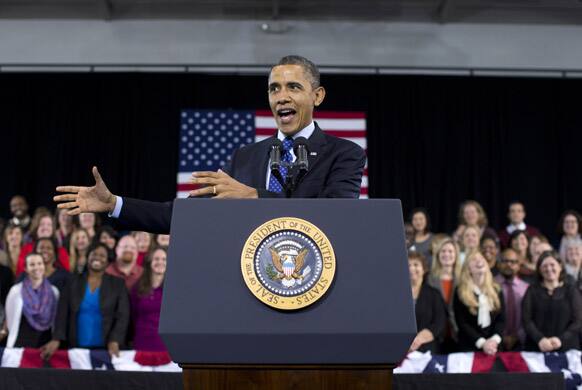 President Barack Obama gestures as he speaks about education, at the Decatur Community Recreation Center in Decatur, Ga. The president is traveling to promote his economic and educational plan that he highlighted in his State of the Union address.