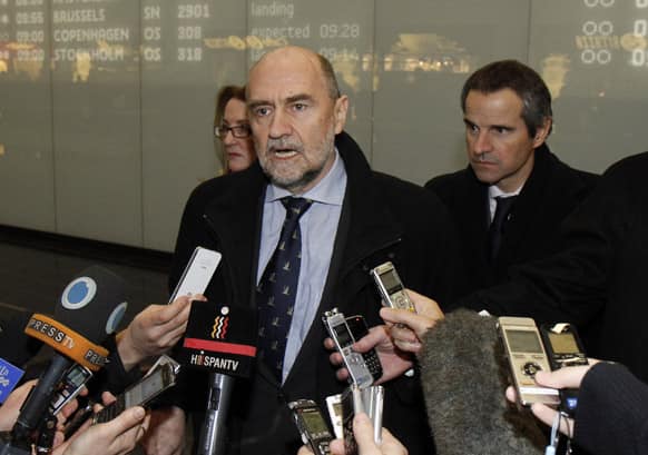 Herman Nackaerts, center, Deputy Director General and Head of the Department of Safeguards of the International Atomic Energy Agency, IAEA, talks to media after his arrival from Iran at Vienna`s Schwechat airport, Austria.