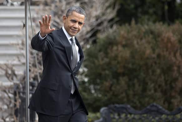 President Barack Obama waves as he leaves the White House in Washington, for Arden, N.C, and the Linamar Corporation to discuss proposals, unveiled in his State of the Union speech, that focus on strengthening the economy for the middle class.