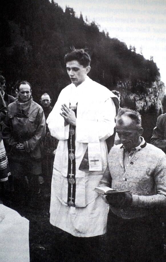FILE - In this 1952 file photo Father Joseph Ratzinger celebrates an open air Mass in Ruhpolding, southern Germany. Ratzinger, who later became Pope Benedict XVI, announced Monday, Feb. 11, 2013 that he will resign on Feb. 28.