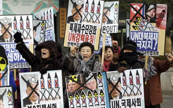South Korean protesters shout slogans during an anti-North Korea rally following a report of the nuclear test conducted by North Korea.