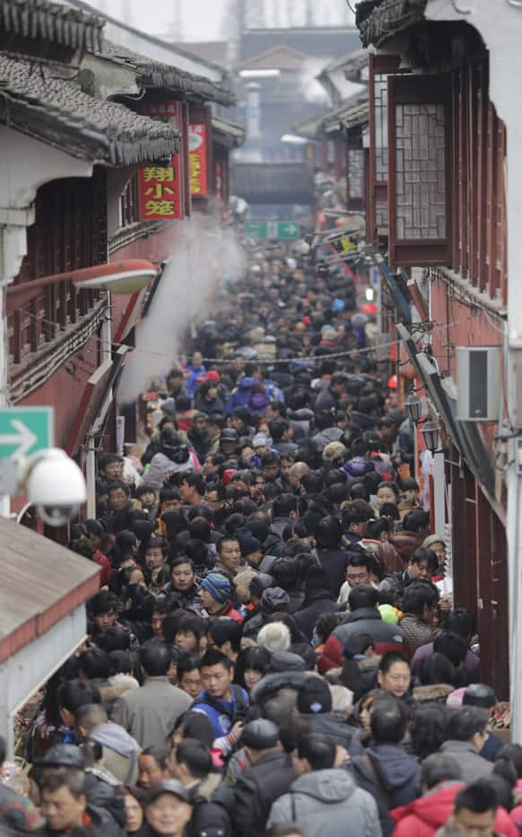 Visitors crowd a shopping street on the third day of the Chinese Lunar New Year in an old part of Shanghai. Chinese celebrate the arrival of the Year of the Snake, according to the Chinese Zodiac.