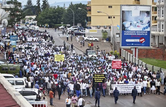 Survivors of the genocide, youths and students march towards the offices of the International Criminal Tribunal of Rwanda (ICTR), whom they accused of denying justice to genocide victims, in Kigali, Rwanda.