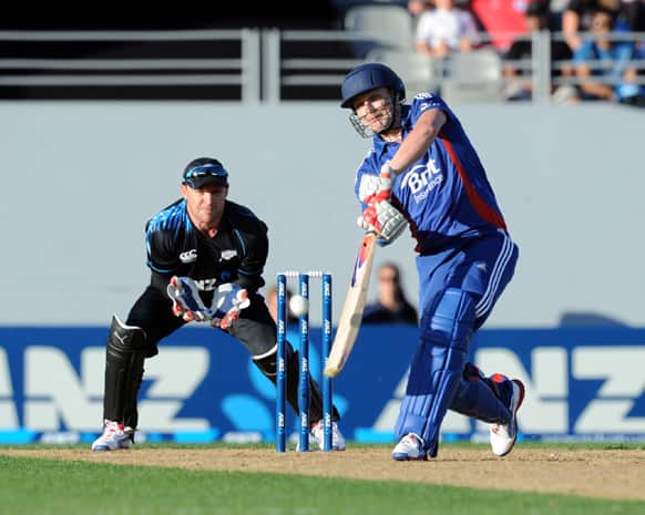 England`s Luke Wright plays a six in front of New Zealand wicketkeeper Brendon McCullum, in their Twenty20 cricket match at Eden Park, Auckland, New Zealand.