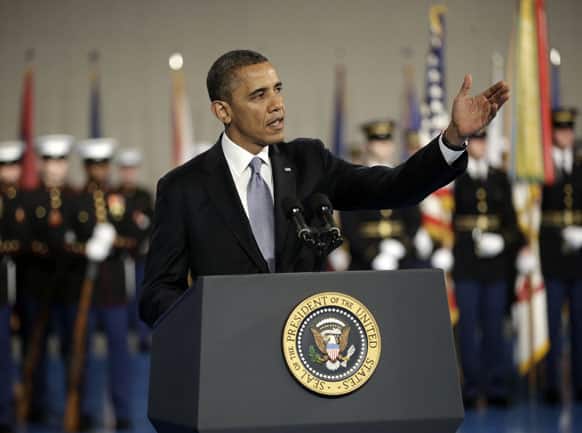 President Barack Obama gestures speaks during an Armed Forces Farewell Ceremony to honor outgoing Defense Secretary Leon Panetta.