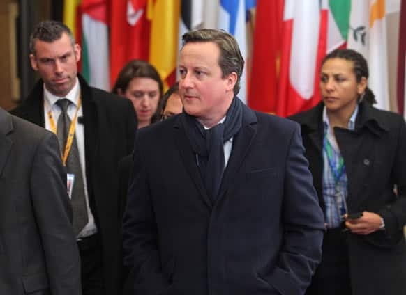 British Prime Minister David Cameron takes a small break in the morning, during the EU Budget summit at the European Council building in Brussels.